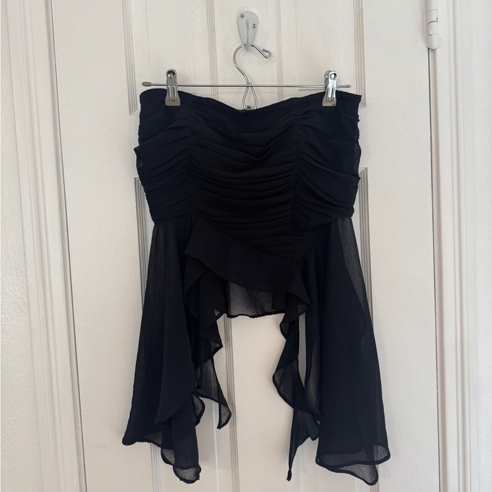 Float black free people top, size S but fits M as well.